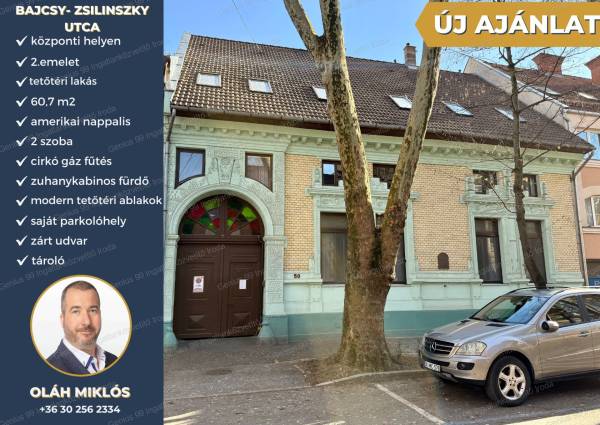 #9401 Kaposvár belvárosában a Bajcsy-Zsilinszky utcában eladó egy, 60,7 m2-s amerikai konyhás nappalis + 2 szobás tetőtéri lakás, saját parkoló hellyel, a társasház zárt udvarában. 